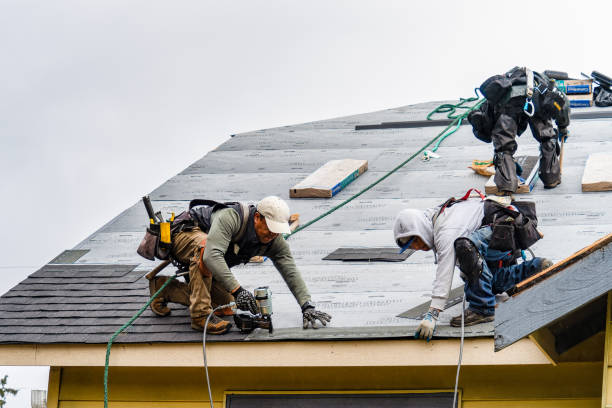 Professional Roof Repair technician working in Clayville, RI